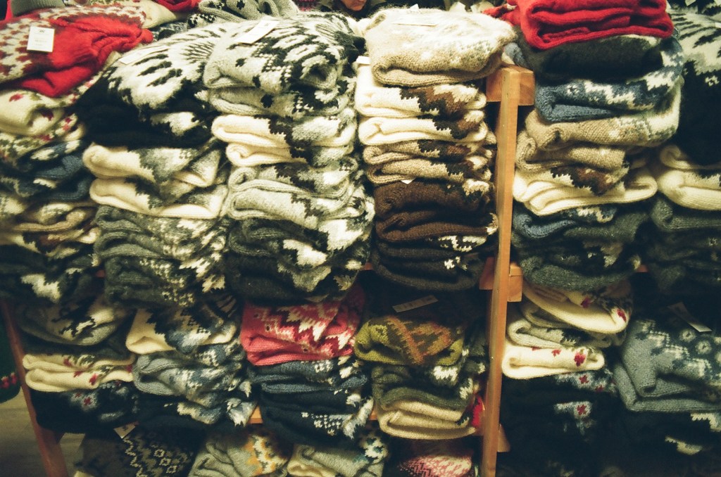 Shelves stuffed with Icelandic lopapeysa sweaters